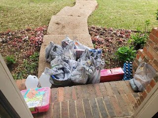 Food Delivered Bags and trays of food delivered at Alynda's front door step